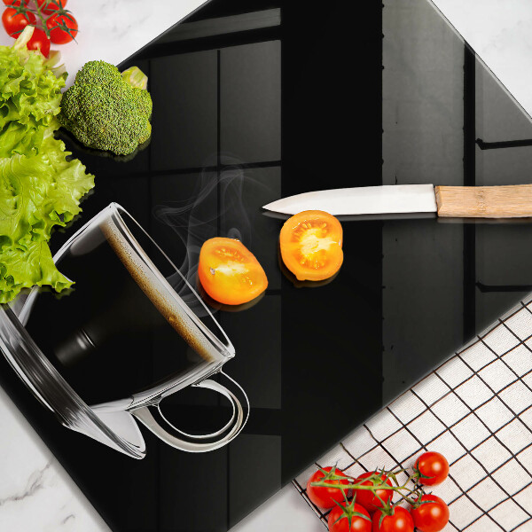 Tábua para cozinha Um copo de café quente