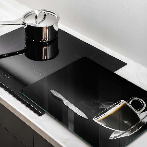 Tábua para cozinha Um copo de café quente