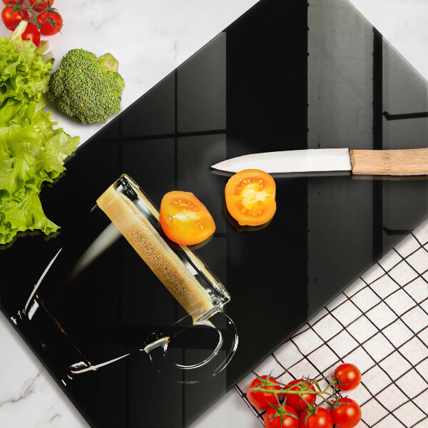 Tábua de cortar de vidro Um copo de café preto