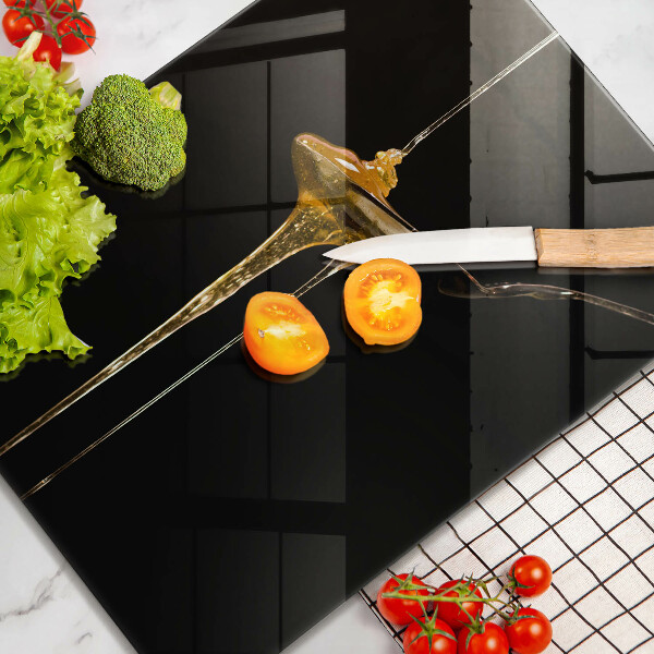 Tábua de cortar de vidro Uma colher de chá de mel