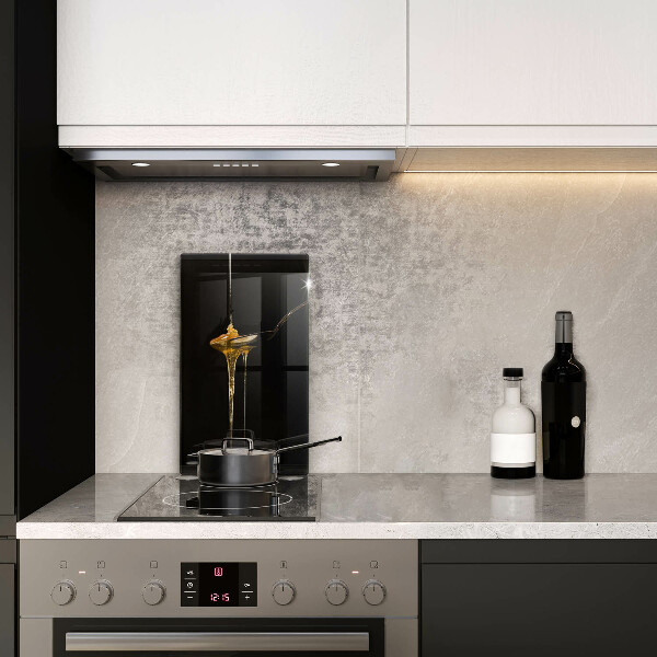 Tábua de cortar de vidro Uma colher de chá de mel