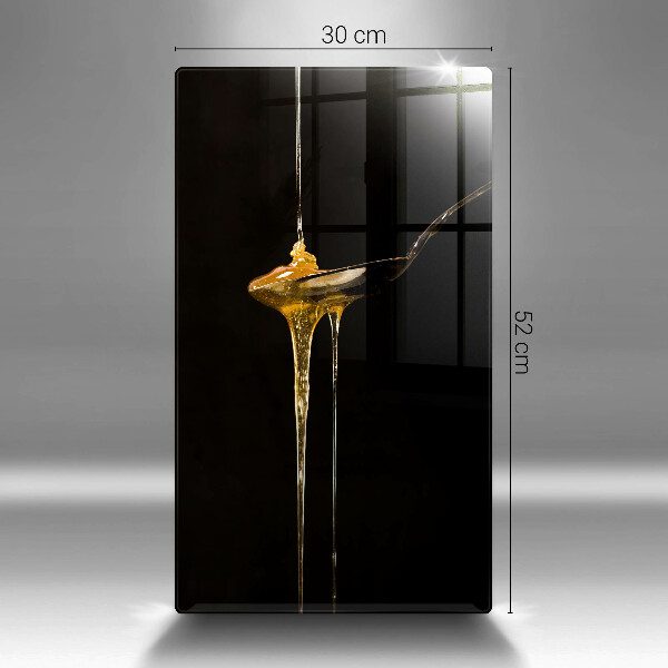 Tábua de cortar de vidro Uma colher de chá de mel