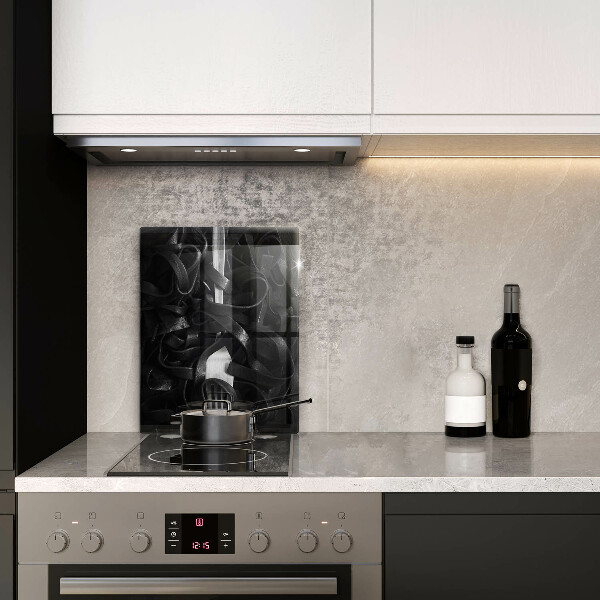 Tábua de corte Macarrão preto e um garfo