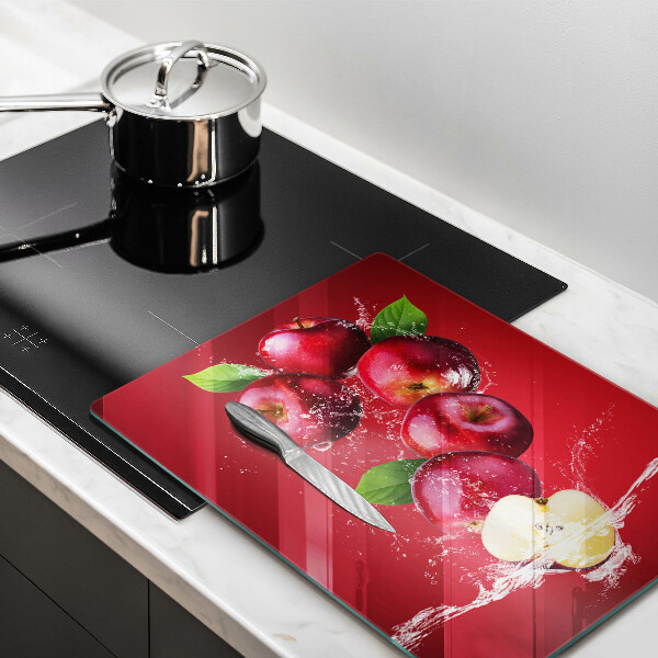 Tábua de cortar alimentos Maçãs suculentas na água