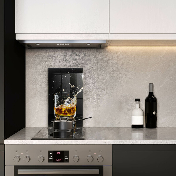 Tábua de corte de vidro Um copo de uísque