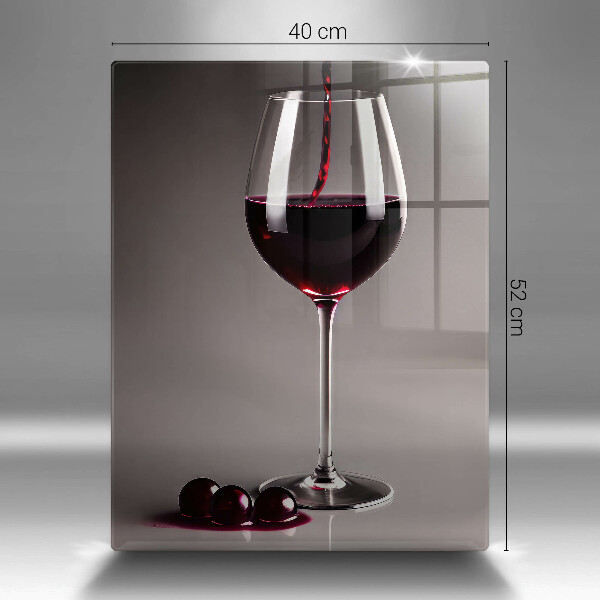 Tábua para corte Um copo e uvas