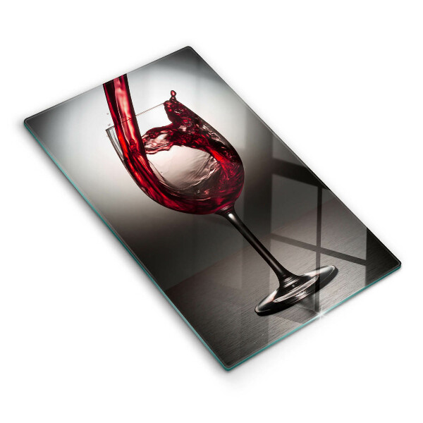 Tábua corte Um copo e vinho tinto