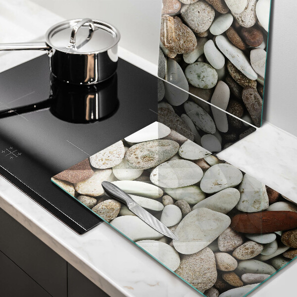 Tábua de corte de vidro Fundo de pequenas pedras