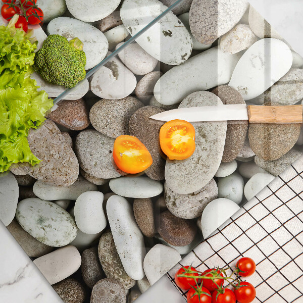 Tábua de corte de vidro Fundo de pequenas pedras