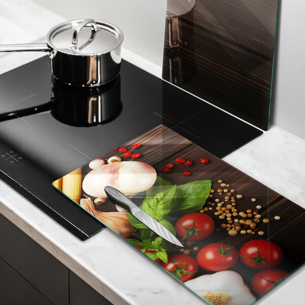 Tábua de cortar de vidro Vegetais na mesa