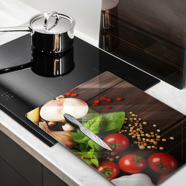 Tábua de cortar de vidro Vegetais na mesa