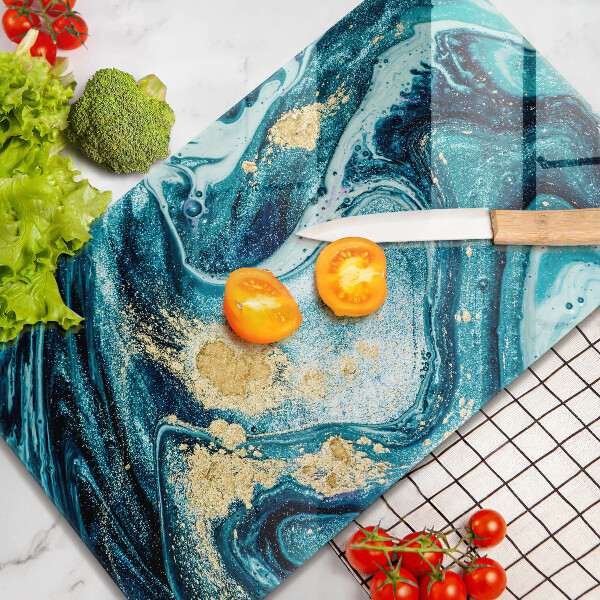 Tábua de cortar de vidro com estampa abstrata azul e dourado
