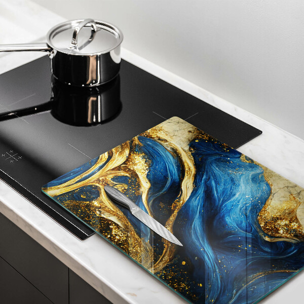 Tábua de corte de mármore azul e dourado