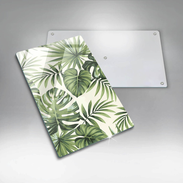Tábua de vidro com ilustração de folhas de monstera