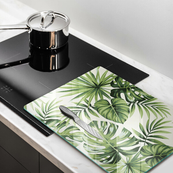 Tábua de vidro com ilustração de folhas de monstera