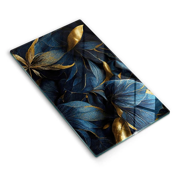 Tábua de corte com estampa de folhas decorativas e detalhes em ouro