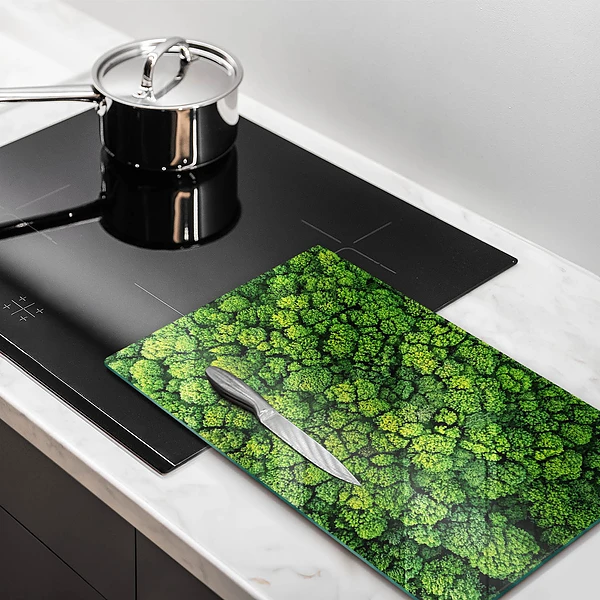 Tábua de corte de vidro com estampa de planta e musgo