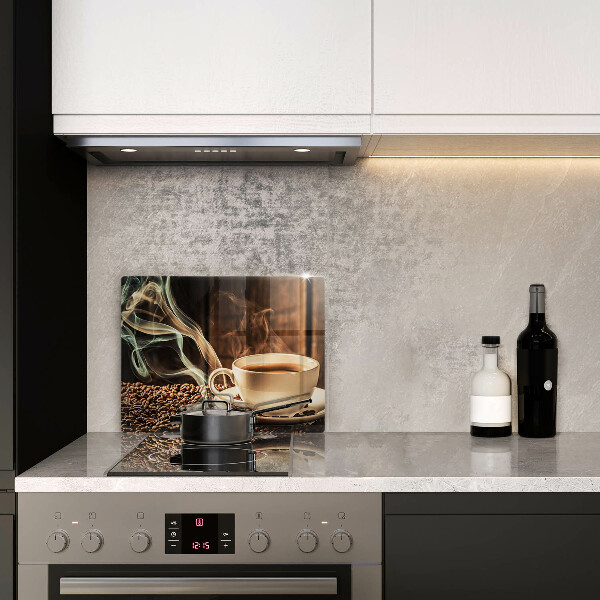 Tábua de corte de vidro Uma xícara e grãos de café