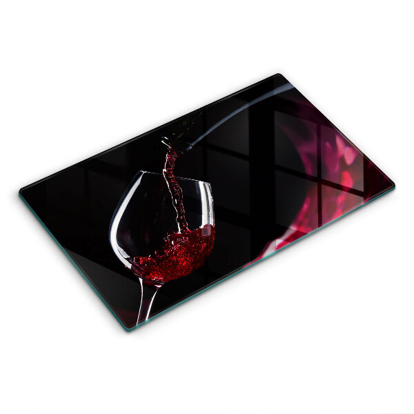 Tábua de corte Um copo de vinho tinto