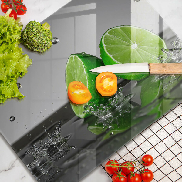 Tábua de cortar alimentos Limões suculentos e água