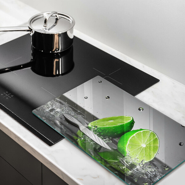 Tábua de cortar alimentos Limões suculentos e água