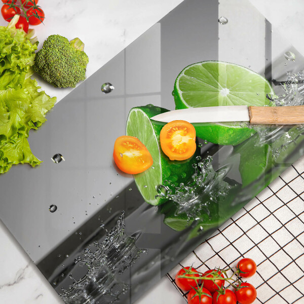 Tábua de cortar alimentos Limões suculentos e água