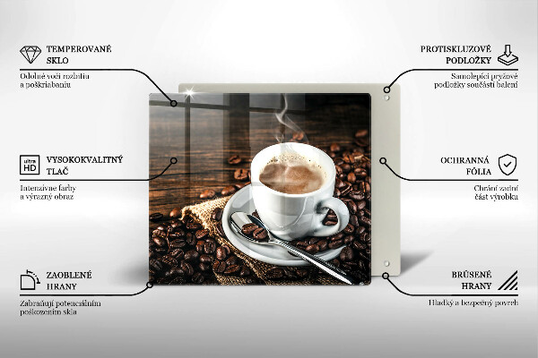 Tábua de cortar Uma xícara e grãos de café