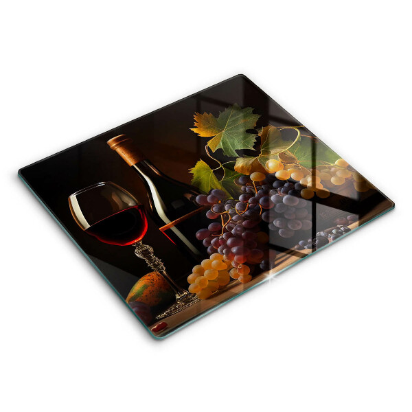 Tábua para cozinha Um copo de vinho e uvas