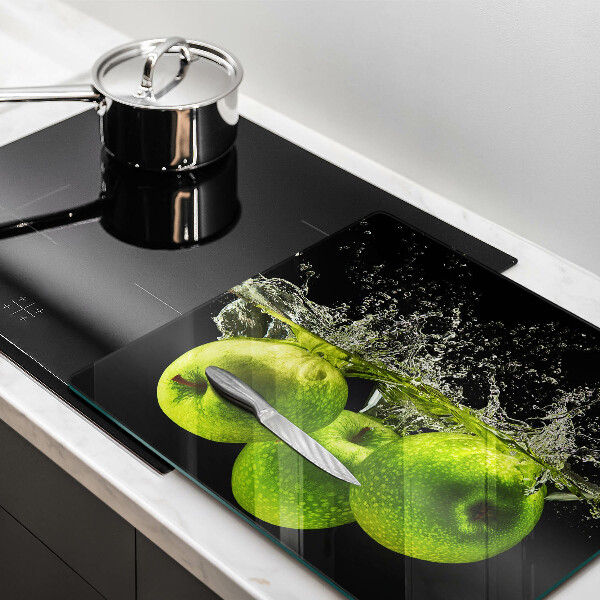 Tábua de cortar Maçãs verdes e água