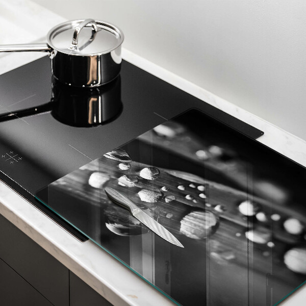 Tábua de cortar de vidro Gotas de orvalho nas folhas