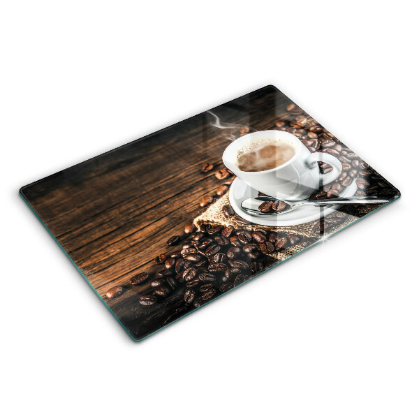 Tábua para cozinha Uma xícara e grãos de café