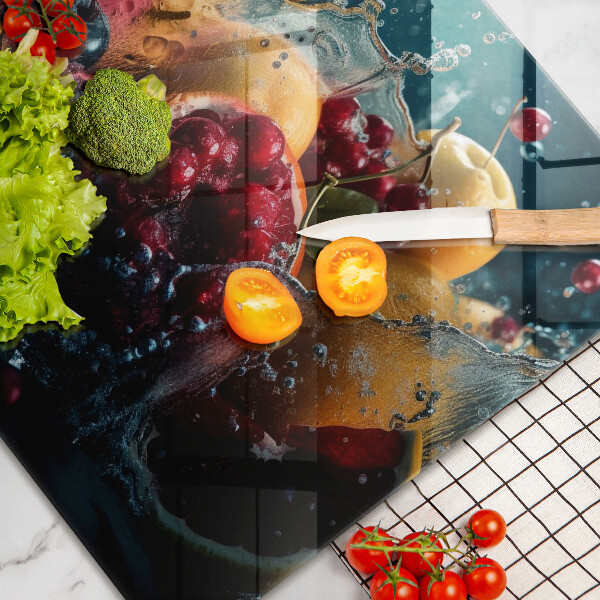 Tábua de corte de vidro Fruta na água