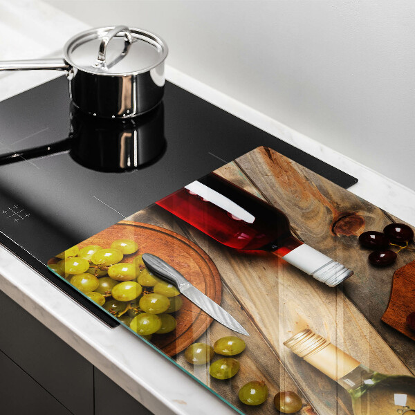 Tábua de corte Garrafas de vinho e uvas