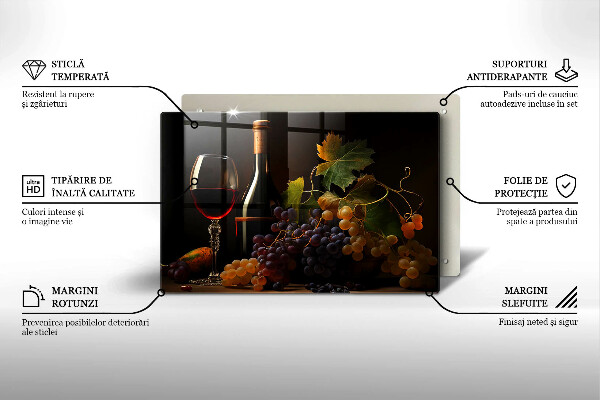 Tábua de cortar de vidro Um copo de vinho e uvas