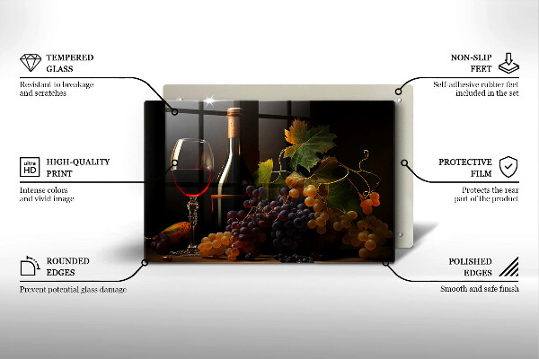 Tábua de cortar de vidro Um copo de vinho e uvas