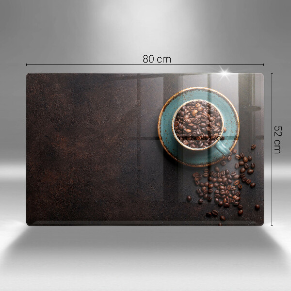 Tábua para corte Uma xícara de grãos de café