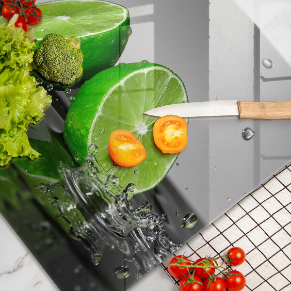 Tábua de cortar alimentos Limões suculentos e água