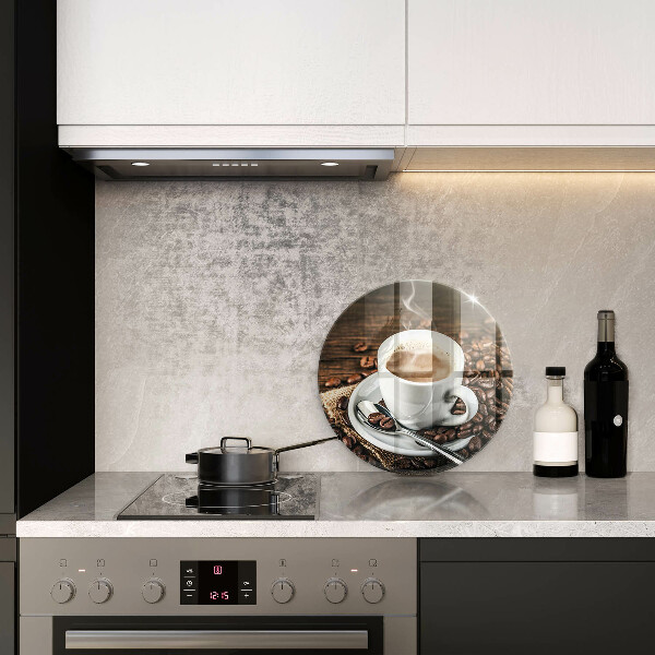 Tábua cozinha Uma xícara e grãos de café