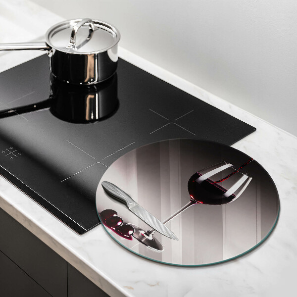 Tábua de cortar alimentos Um copo e uvas