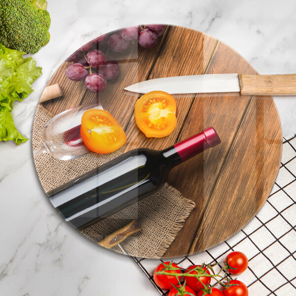 Tábua de cortar alimentos Uma garrafa de vinho tinto