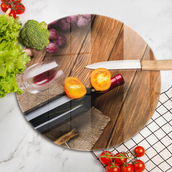 Tábua de cortar alimentos Uma garrafa de vinho tinto