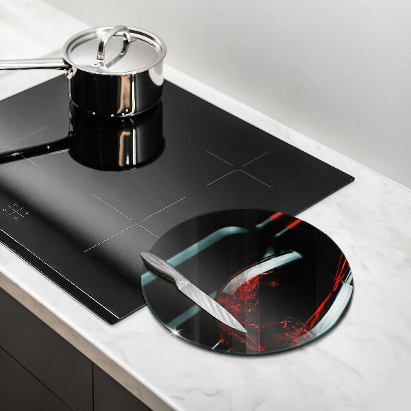 Tábua para cozinha Uma garrafa de vinho e um copo