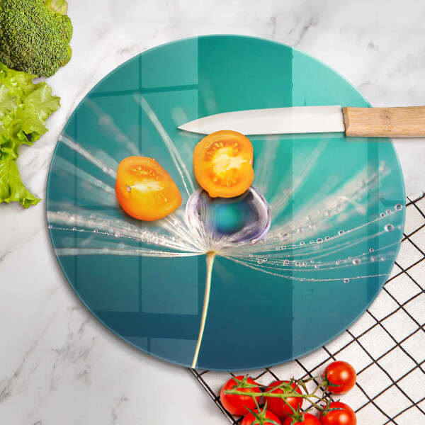 Tábua de cortar alimentos Orvalho em um dente-de-leão