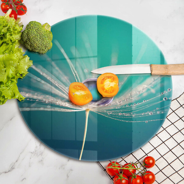 Tábua de cortar alimentos Orvalho em um dente-de-leão