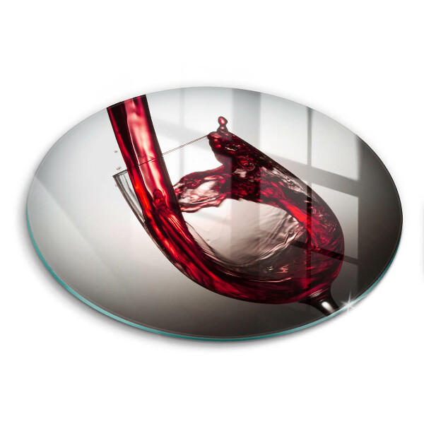 Tábua de corte de vidro Um copo e vinho tinto