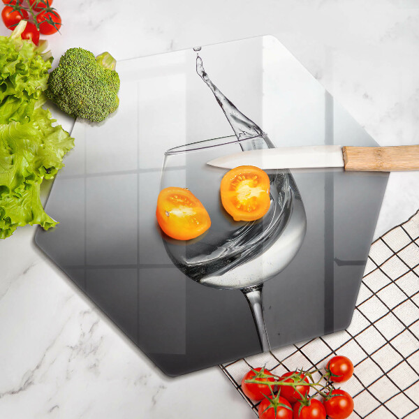 Tábua de cortar Um copo de água