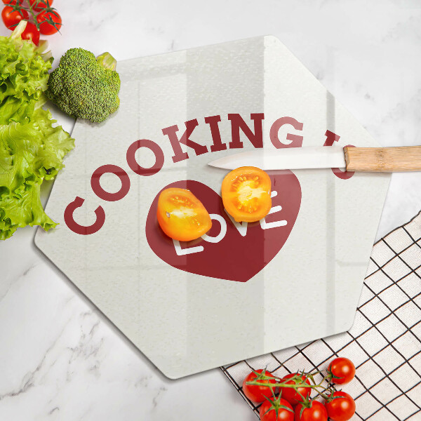 Tábua de corte de vidro A inscrição Cozinhar é amor