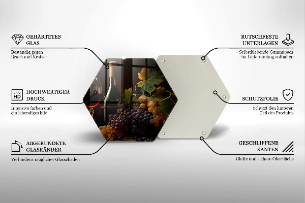 Tábua de corte de vidro Um copo de vinho e uvas