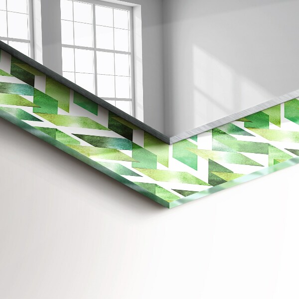 Espelho com moldura decorada em padrão geométrico verde