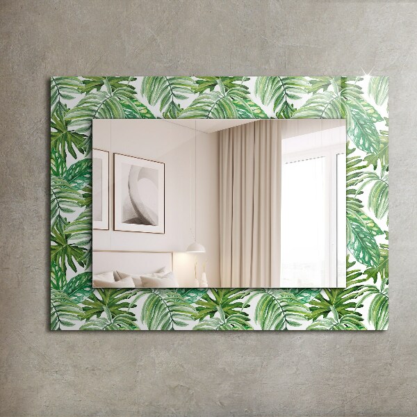 Espelho com moldura decorada com folhas verdes tropicais